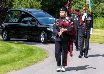 Tributes paid to musical Normandy veteran