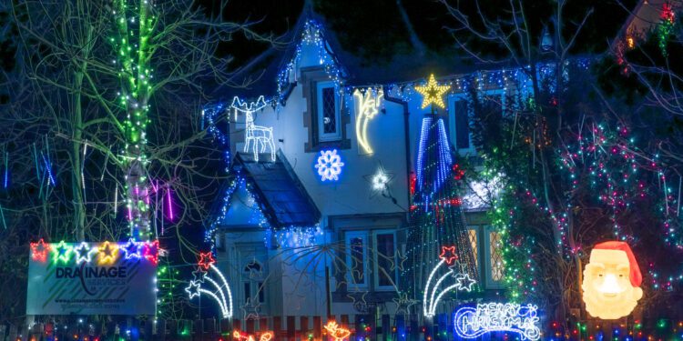 Westbury home’s Christmas display lights up for charity