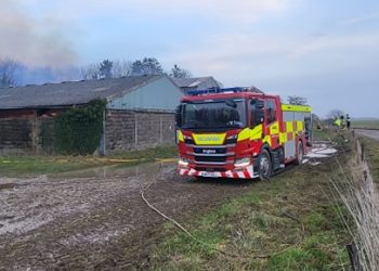 Man charged after barn fire near the White Horse