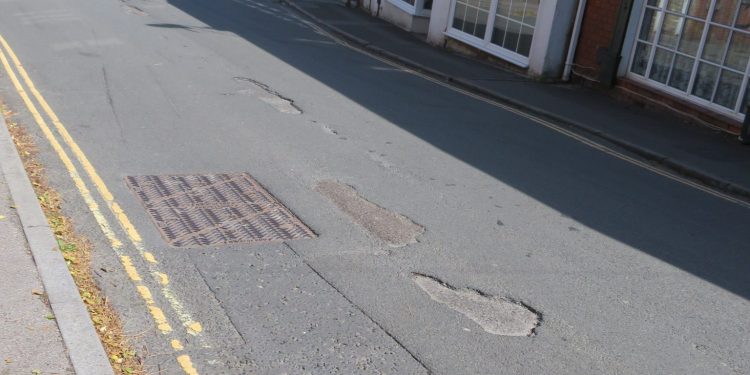 Concern over town centre street ‘pitted with potholes’