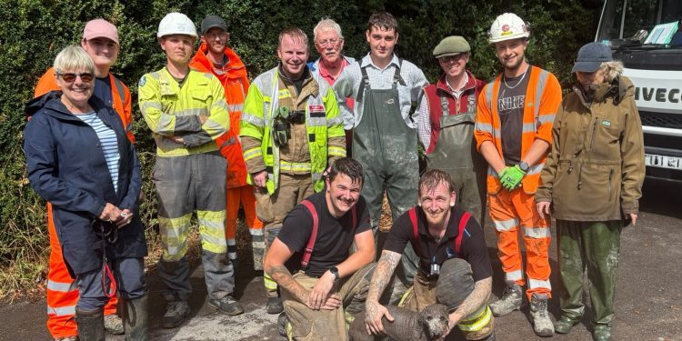 Westbury firefighters rescue dog trapped in pipe