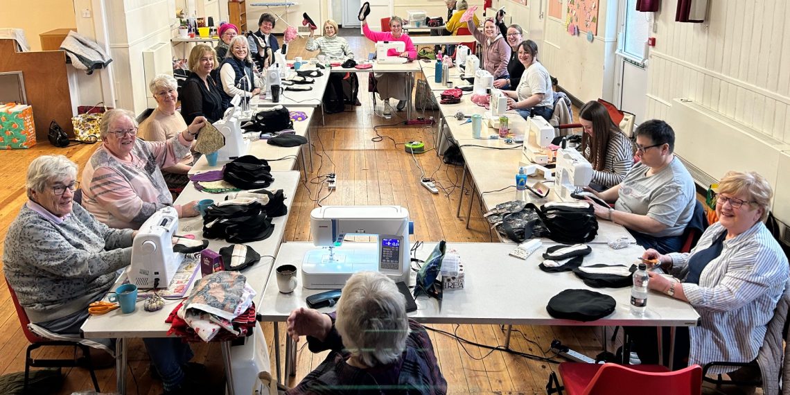 Volunteers sew hundreds of pads for schools in Uganda