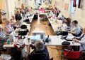 Volunteers sew hundreds of pads for schools in Uganda