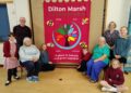 Community and pupils join forces on colourful school banner
