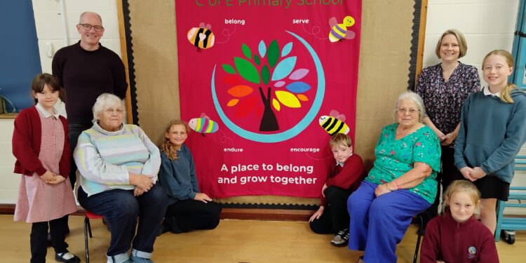 Community and pupils join forces on colourful school banner