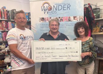 Second-hand shop supports charity with £1,000 donation