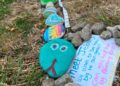 Community helps children’s rock snake grow