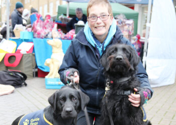 Westbury guide dog puppy raiser encourages others to volunteer